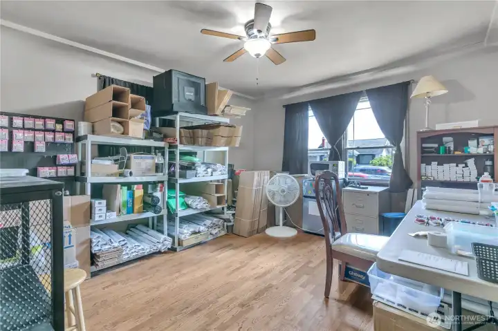 Bedroom on main level used as home office storage space