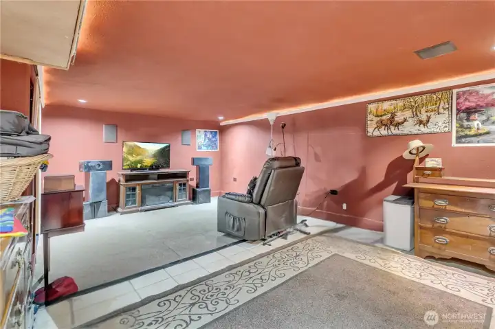 Basement living area with separate side entrance for 4th BR, storage, hobbies, or future expansion