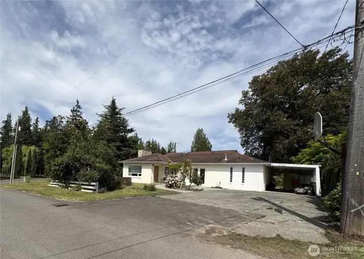 Livable handy person special. Finish what the seller could not. Extra large lot with tons of potential to add an additional dwelling unit. All utilities on the street for future building potential.