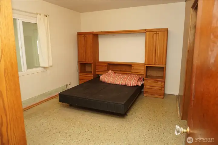 Second room with twin closet opening unfinished. Furniture can stay if it is not sold during the open houses.