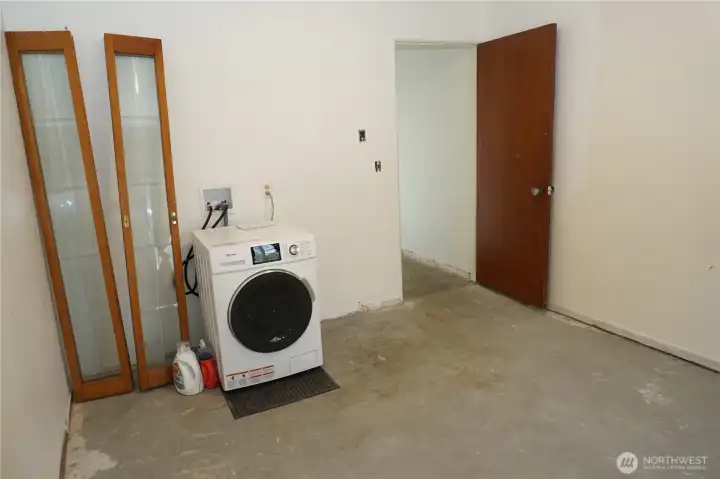dual washer and dryer combo stay with the house. Located in the bonus room.