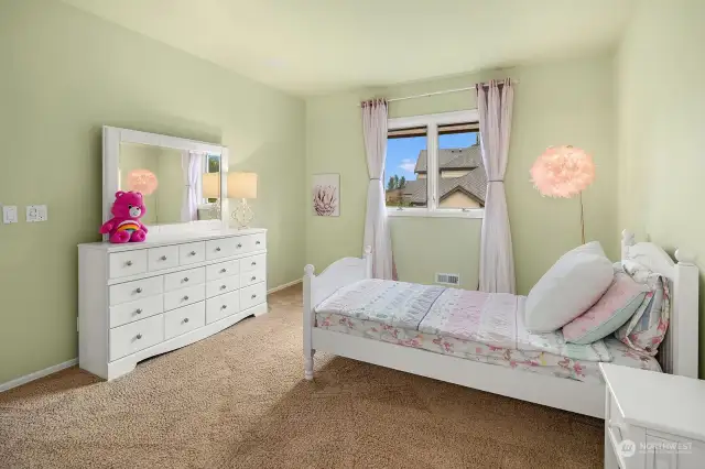 Upper level bedroom with a NEWLY REMODELED en-suite bathroom.