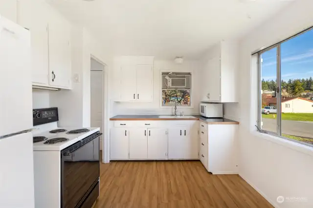 Cute kitchen that opens nicely to the living room.