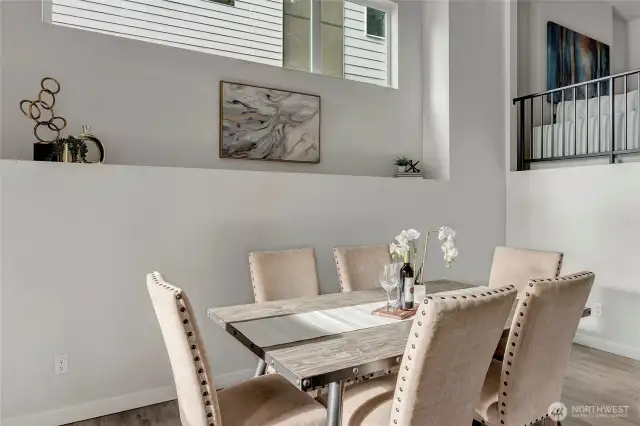 Two tiered dining and living space (model home lot 24)