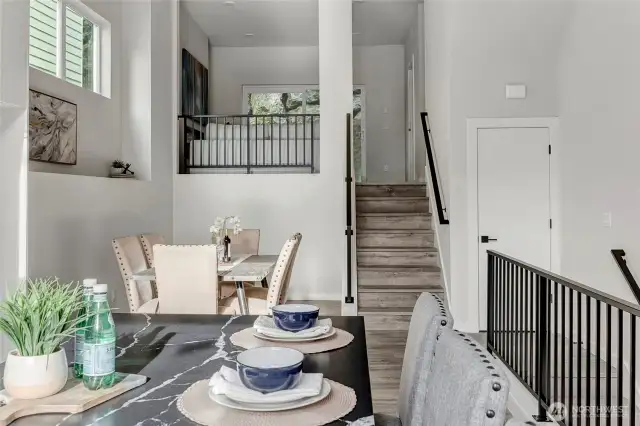 Two tiered dining and living space (model home lot 24)