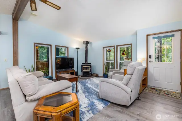 The living room area is spacious, inviting, and ready to be enjoyed with great company!