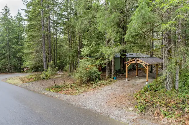The home blends beautifully into the natural setting, offering both convenience and tranquility.