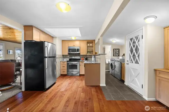 This functional home offers the ease of main-level living with everything within reach. Beautiful hard-surface flooring is not only easy to maintain but also built to stand the test of time.