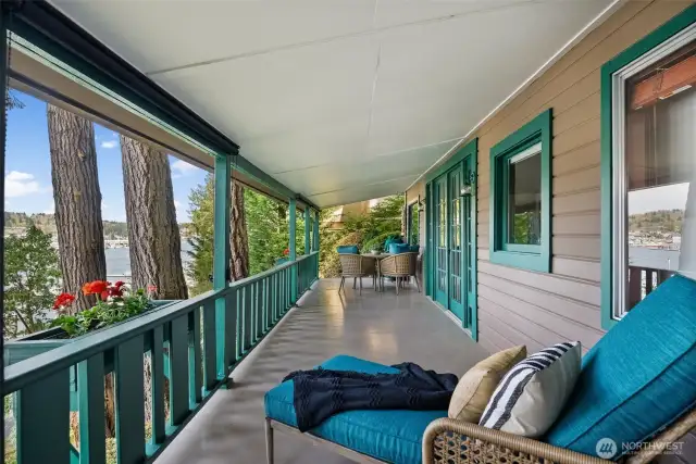 A covered deck runs the length of the home for year round enjoyment!