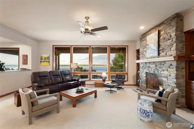 Main floor Living Room . The large windows maximize the gorgeous views of the Puget Sound and Cascades.