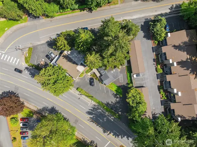 Amazing corner lot location! The triangular lot is at the corner of 100th Ave Ne and Ne 120th Place.