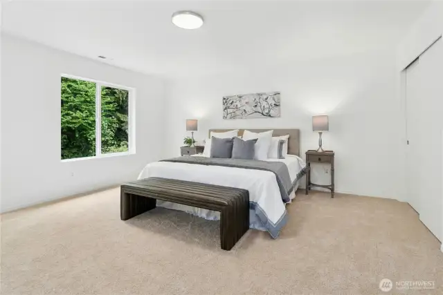 Large primary bedroom with sitting / lounge area