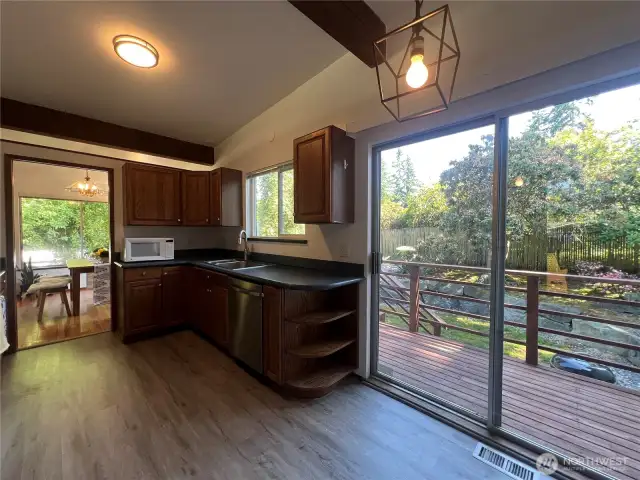 Kitchen nook area with access to the back yard and back deck