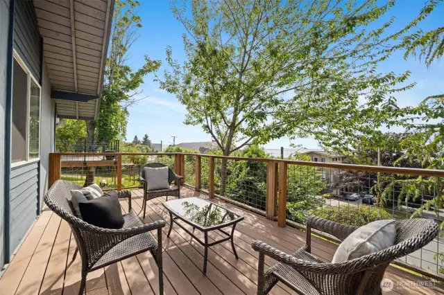 How many rentals offer a sunset bay view on a deck like this??