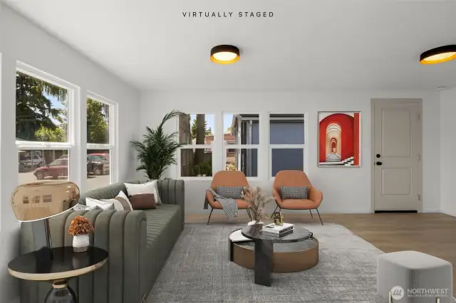 Virtually staged photo of living area facing toward the front door