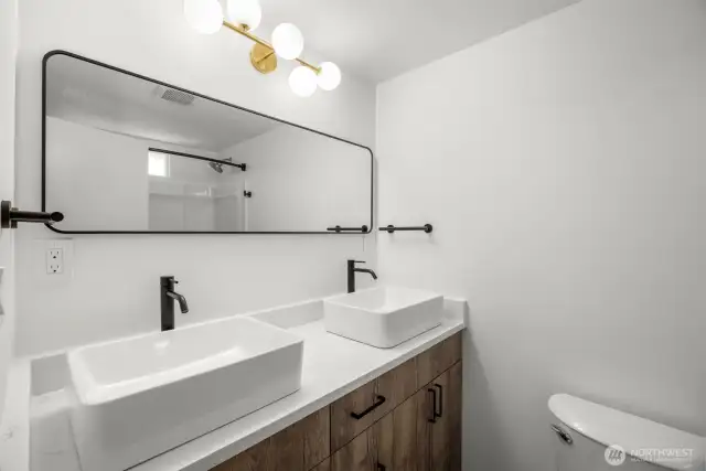 Primary en-suite bathroom with gorgeous new fixtures