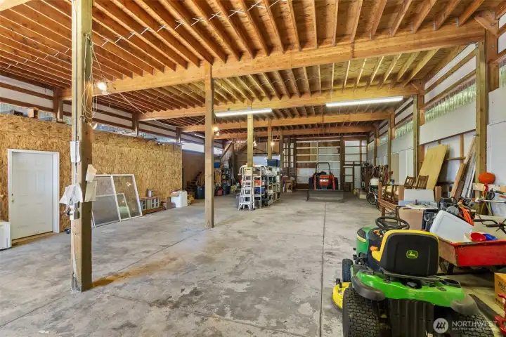 14 ft doors on both ends.  Interior RV 30 amp hookup and sewer connection.