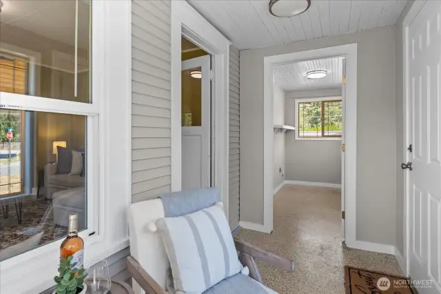 There is a full size utility room off the front porch!