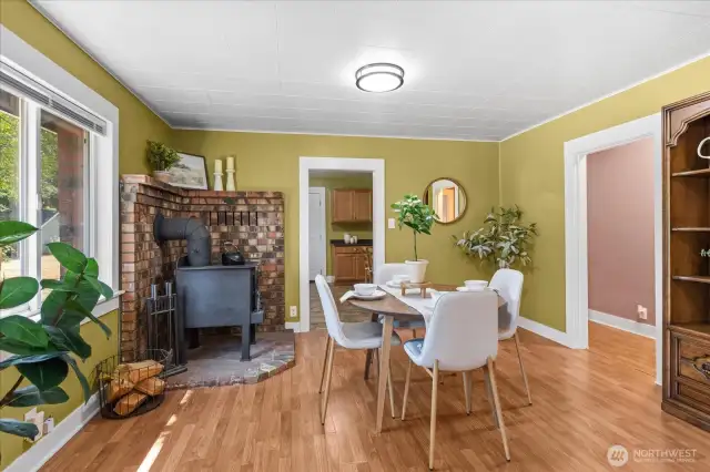 Dining room with freestanding wood stove for those cold PNW nights!