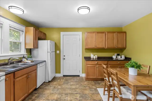 Spacious kitchen with lots of cabinetry.