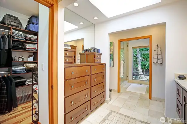 Opposite the sink is a built in dresser.