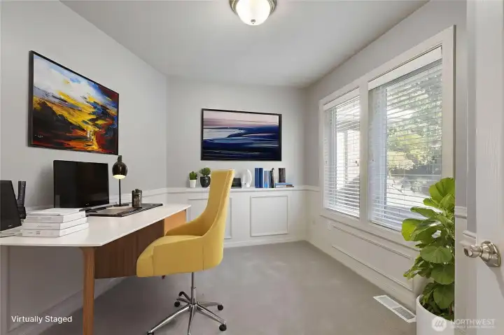 Main floor den features a good size closet, easy access to the guest bathroom and could easily be used as a 5th bedroom.