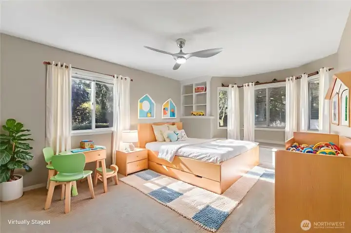 Third bedroom features a window seat and access to a Jack and Jill bathroom.