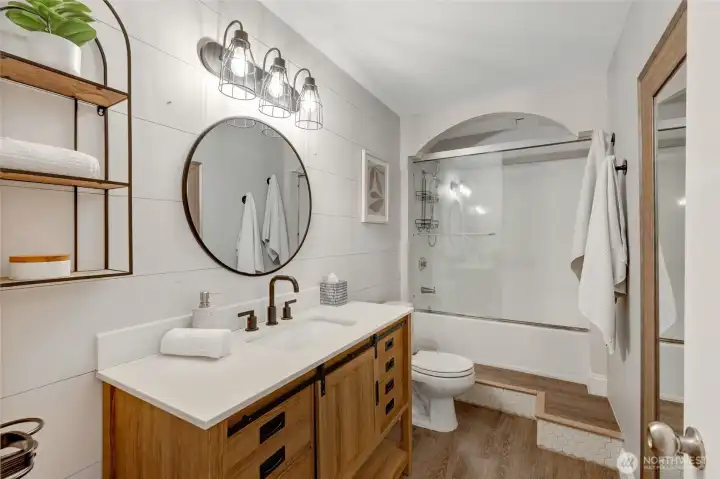 Full bath off the 3rd bedroom downstairs