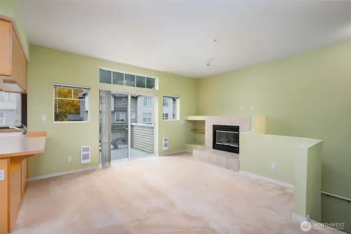 Great living room space w/fireplace and private balcony