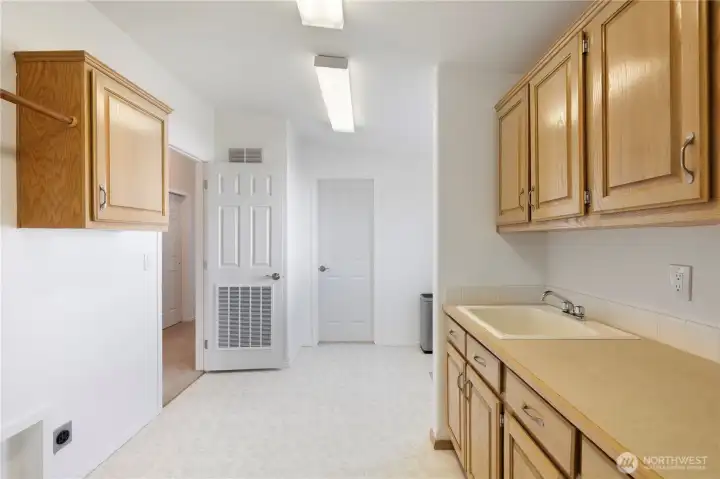 ... And even more storage in the laundry room!