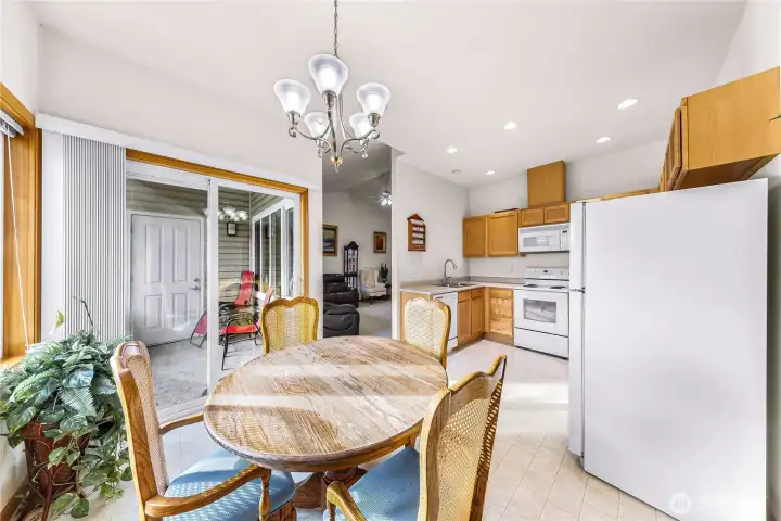 Natural light from large windows and private balcony