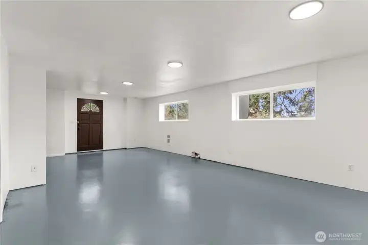 Rec room in basement with exterior access.