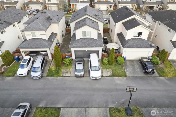 Alley access to 2 car garage & driveway parking