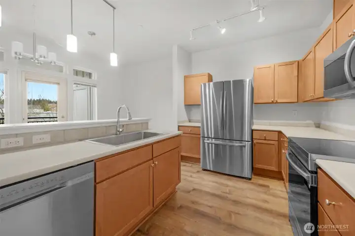 Ample cabinetry and counter space, ideal for cooking and entertaining.