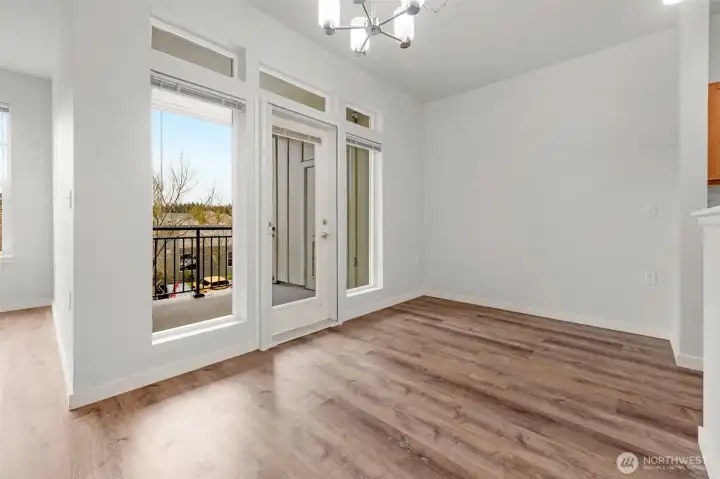Dining area opens up to the covered deck along with a storage closet.