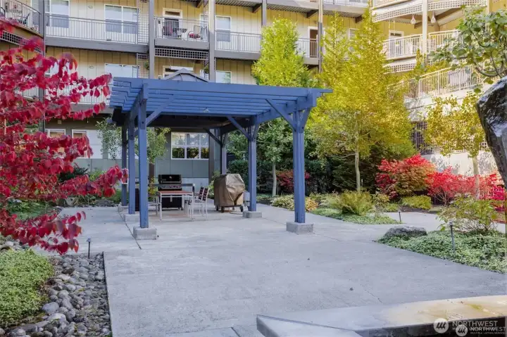 Fall at Village Commons - Outdoor Area W/ 2 BBQ's and dining table/chairs