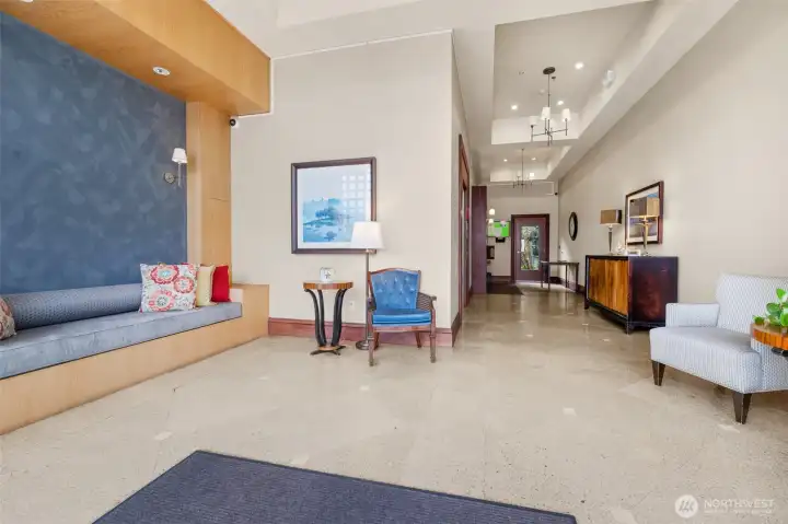 Welcoming lobby featuring a seating area, security cameras for peace of mind, elevator to all floors, and convenient mailboxes.
