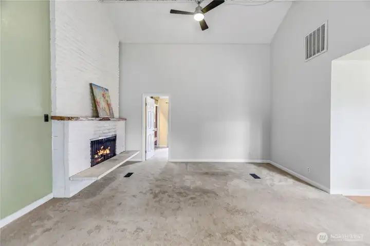A wonderful little nook in the living room to get cozy in front of the fireplace.
