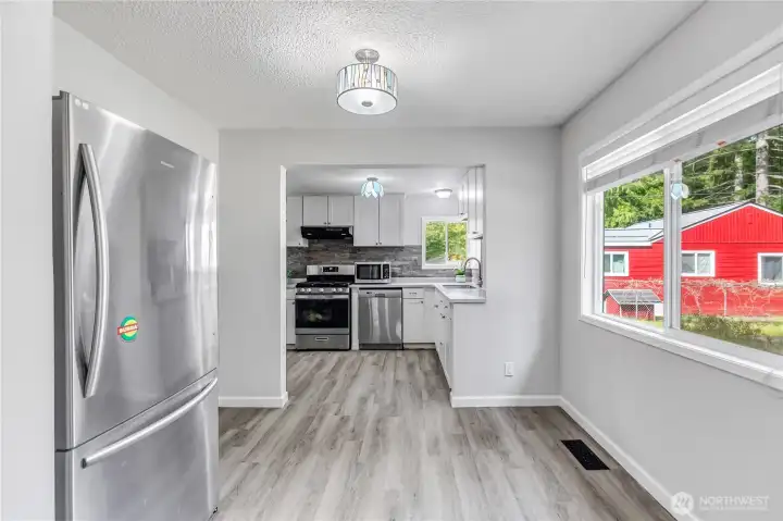 The kitchen has been updated. There is room for a small table in the kitchen area.