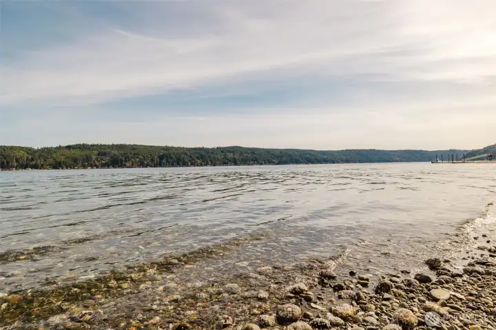 The waves gently ripple as the tide comes in.