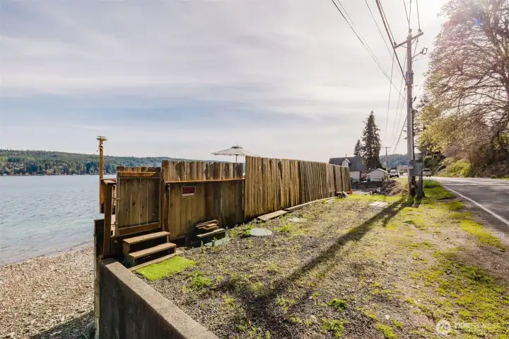 Power pole holds a 50A RV plug and 2-20A outlets. Ring camera and security lights can stay.