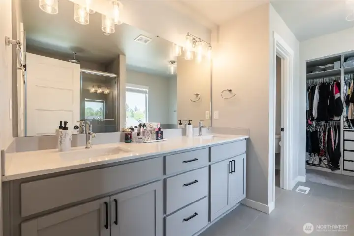 Primary Suite Vanity with Double Sinks and Walk-In closet