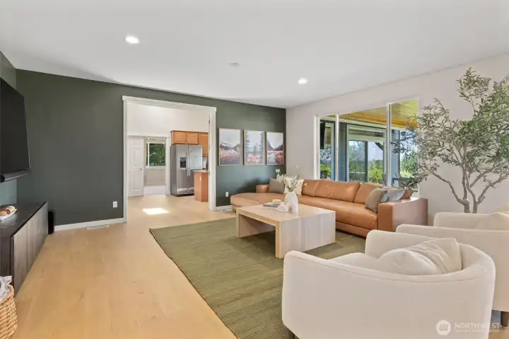 Beautiful living room with views. Access to the apartment is through the French doors.