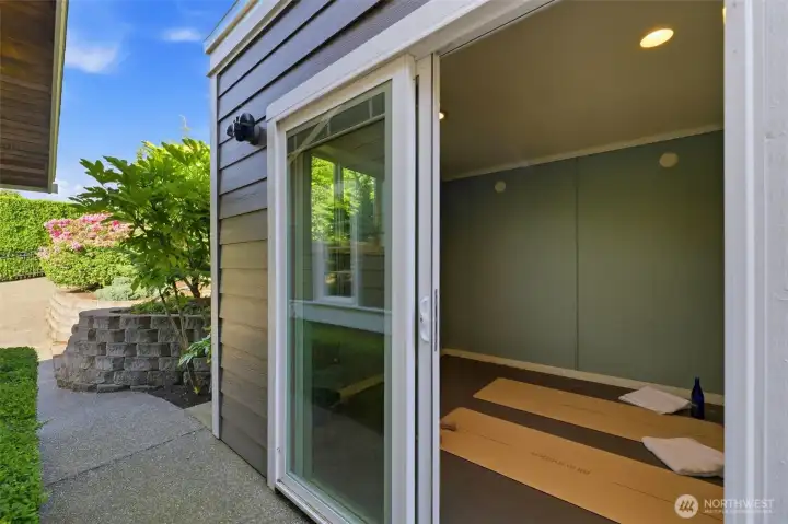 Detached shed used as gym space.