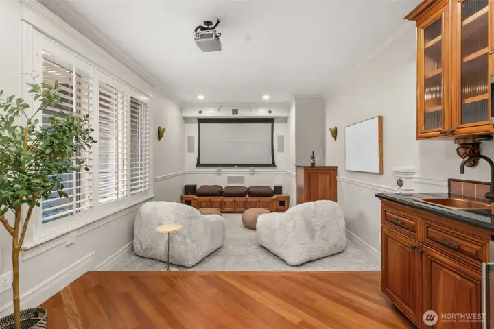 Unwind at the end of the day with a movie in the media room, complete with a wet bar and beverage fridge. Unwind at the end of the day with a movie in the media room, complete with a wet bar and beverage fridge.