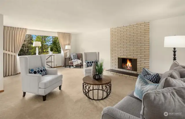 Another view of the formal living room, with a fireplace that is both wood-burning and plumbed for gas.
