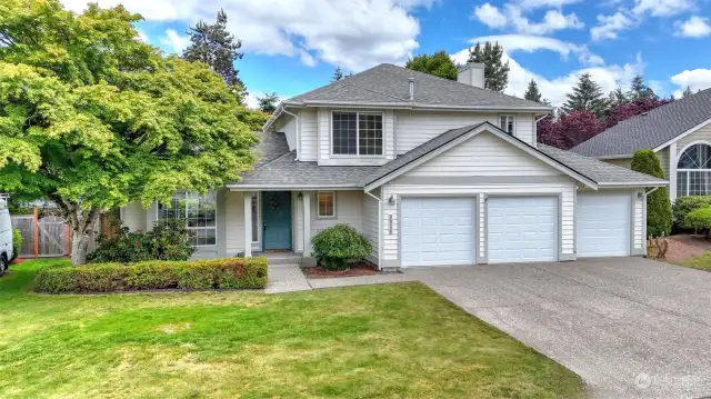 Three car garage plus ample driveway parking for you and your guests!
