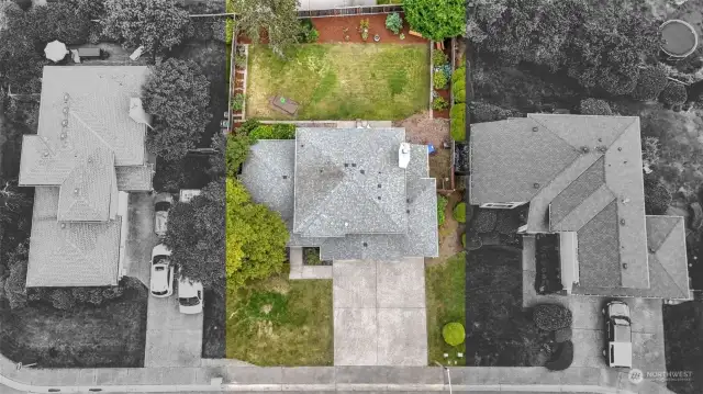 Aerial view of home and yard.