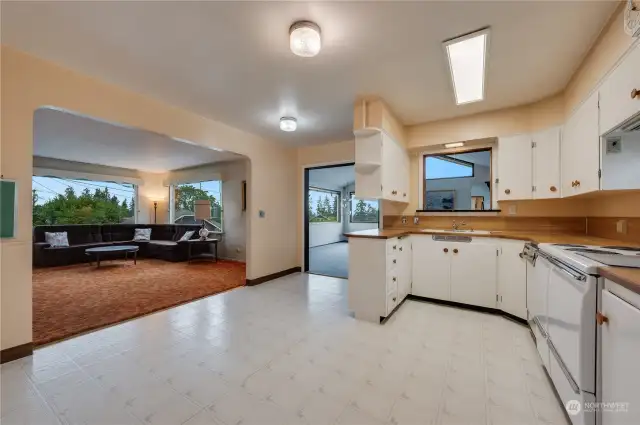 Dining area in the kitchen looking into the living room