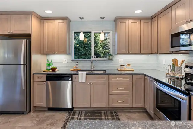 Lovely tile backsplash and under counter lighting - nice finishing touches.